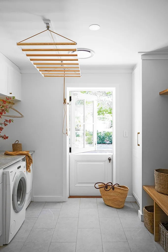 Combined laundry and mudroom with dutch door