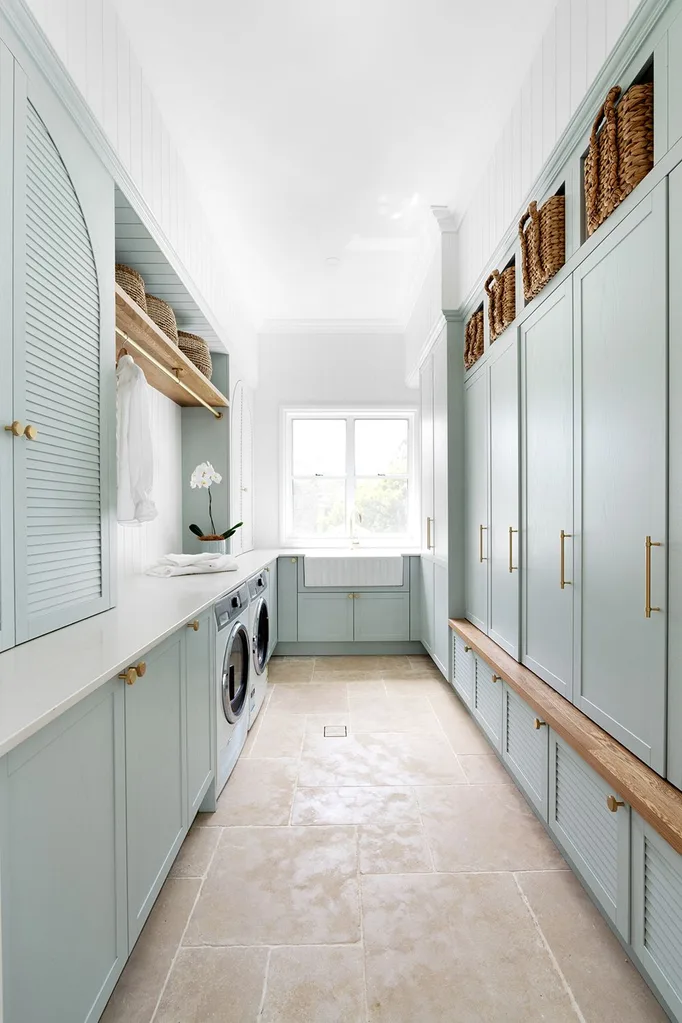 Combined laundry and mud room with modern farmhouse style