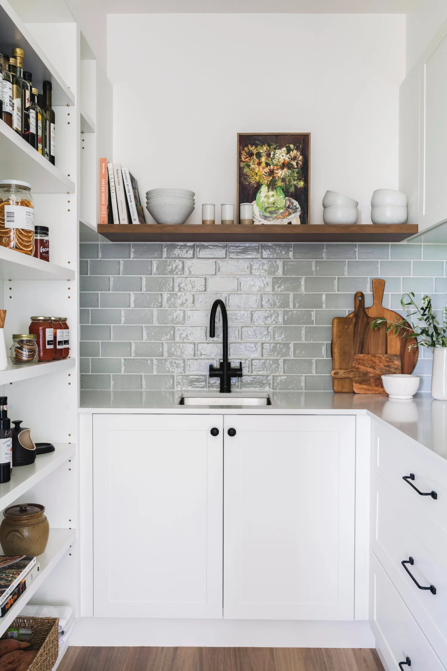 modern farmhouse laundry with grey splashback