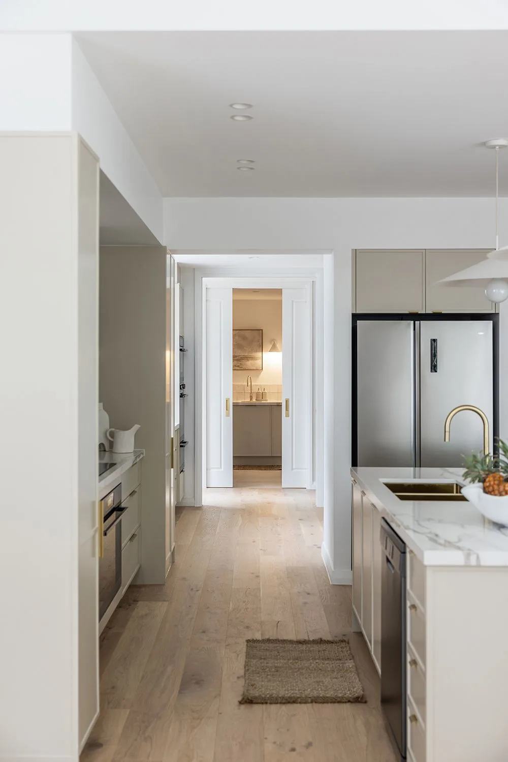 Laundry visible from kitchen and butlers pantry