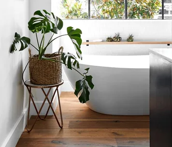 country style bathroom with wooden floors