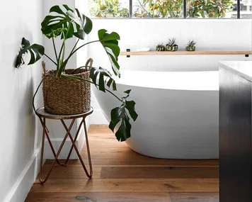 country style bathroom with wooden floors