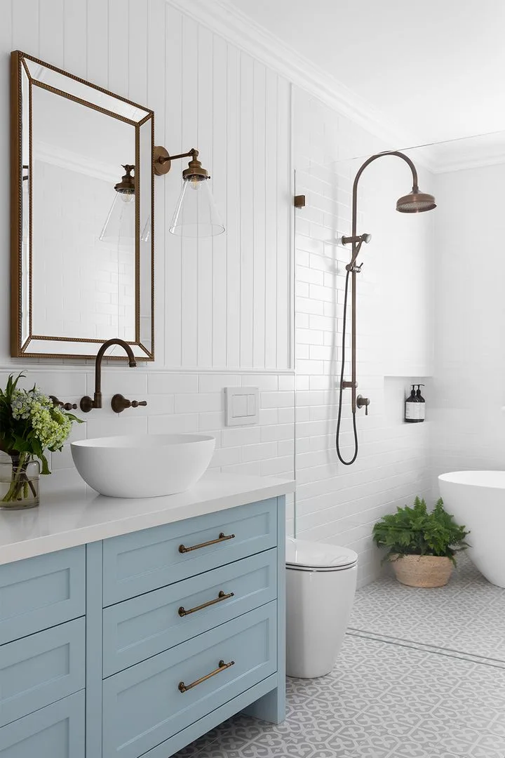 country style bathroom with brass tapware