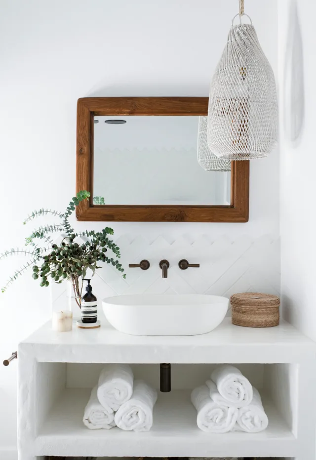 country style bathroom with wooden mirror