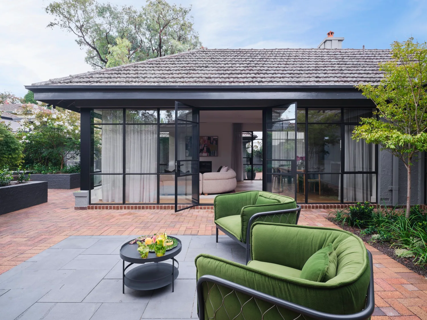 art deco home courtyard green velvet chairs