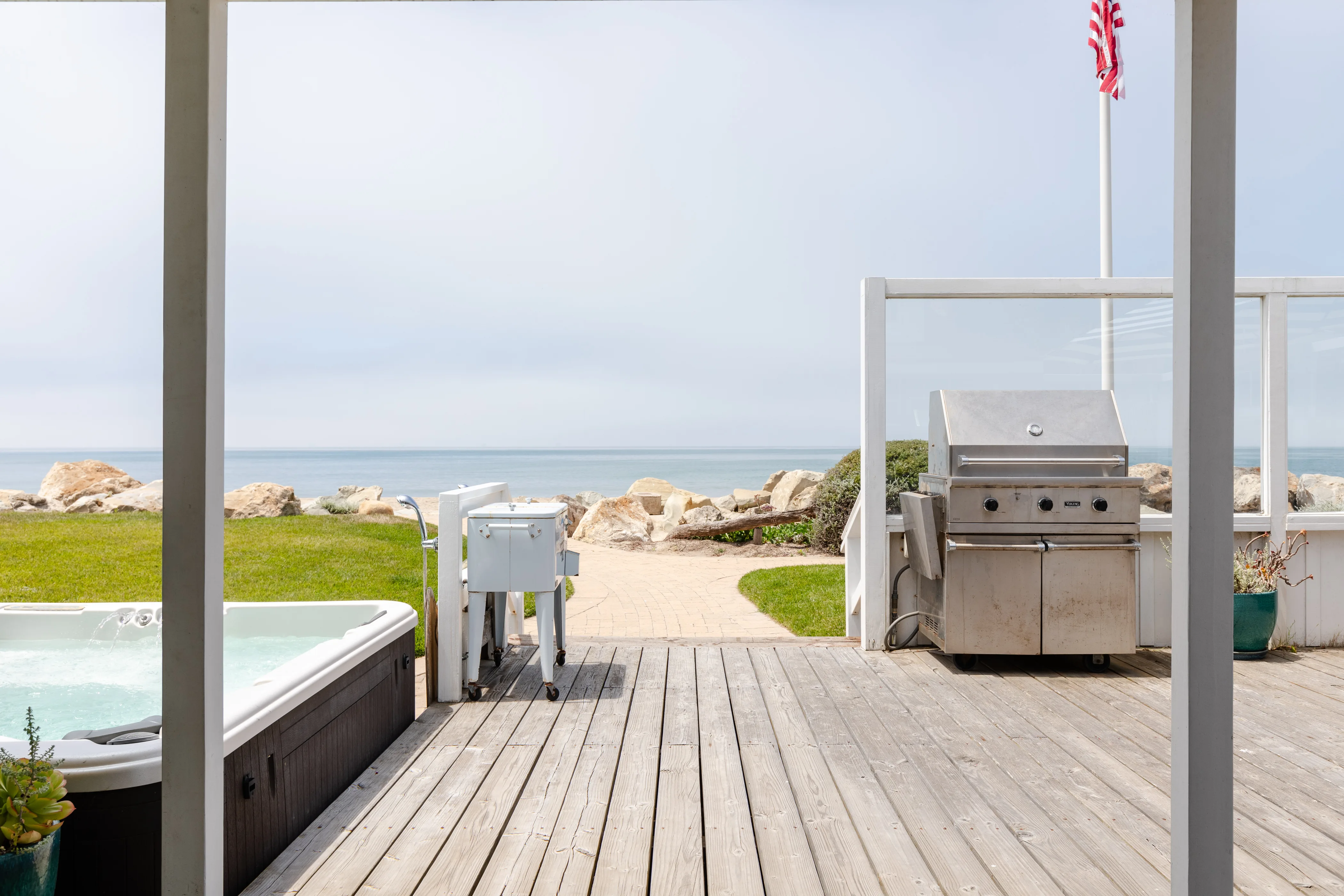 Ashton Kutcha Mila Kunis Beachhouse deck with hot tub and ocean view