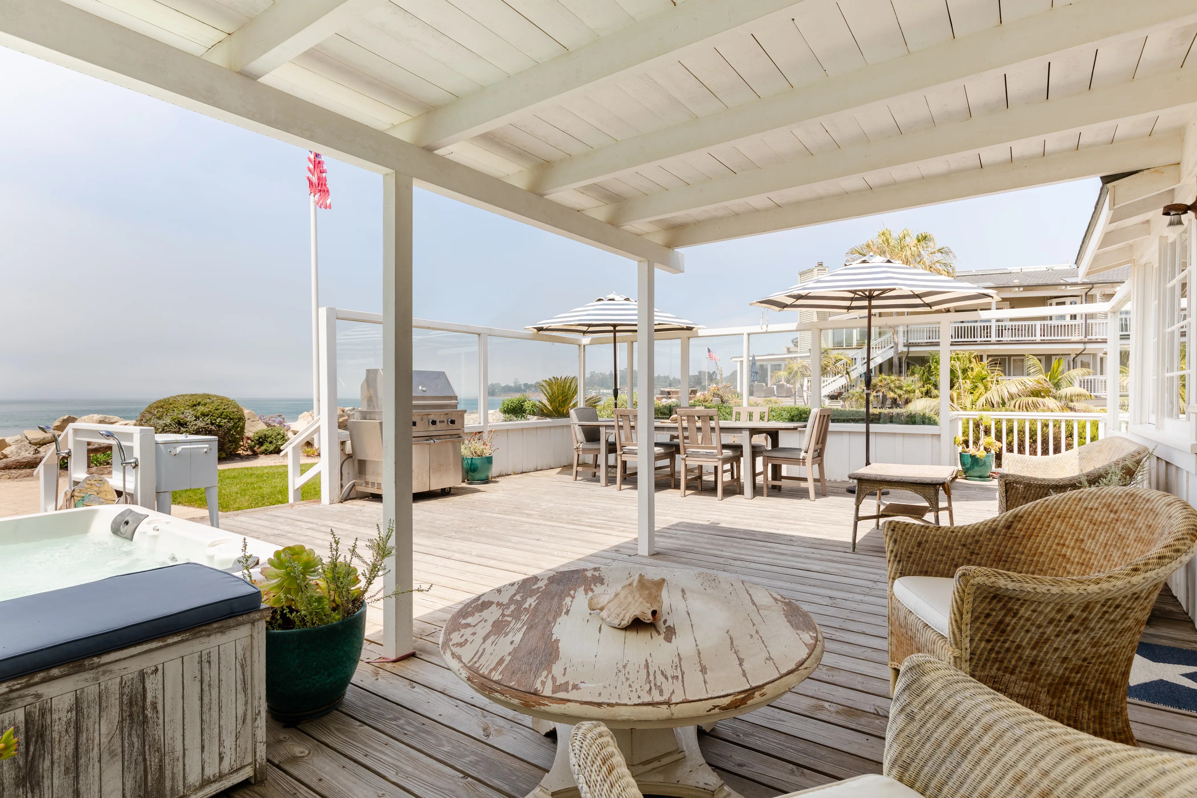 Ashton Kutcha Mila Kunis Beachhouse deck with ocean view
