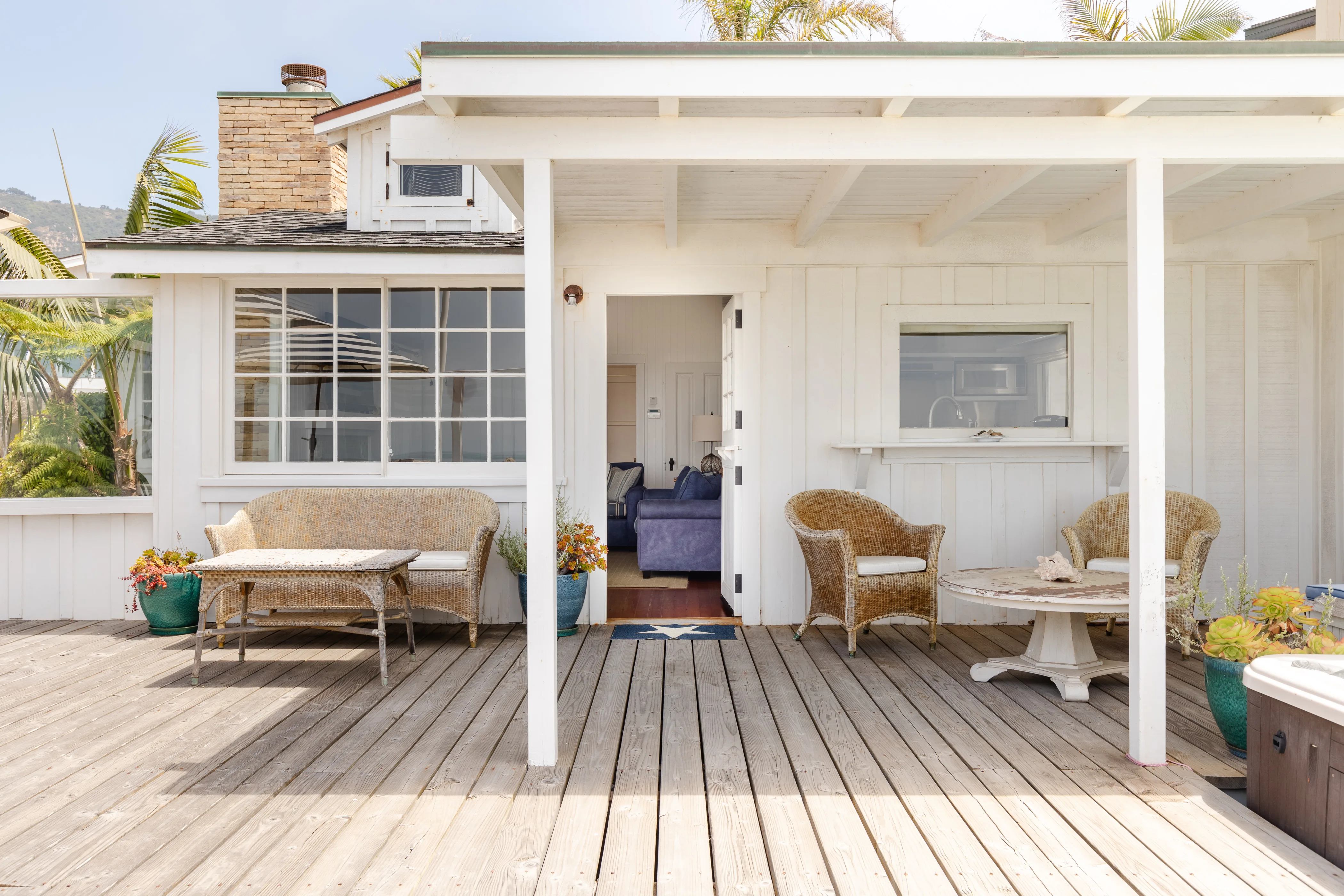 Ashton Kutcha Mila Kunis Beachhouse deck