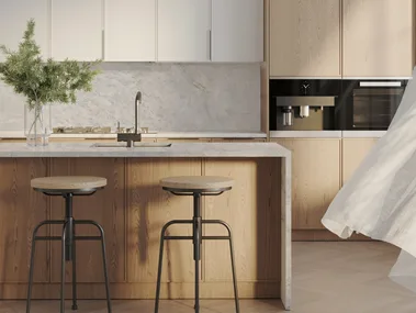 A kitchen with stone benchtops from Neolith in new colour Everest Sunrise.
