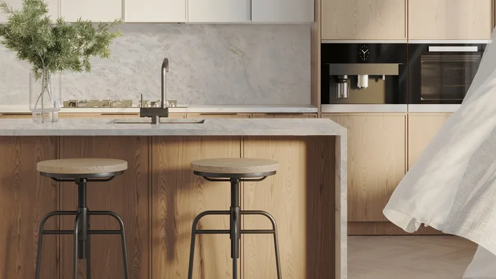 A kitchen with stone benchtops from Neolith in new colour Everest Sunrise.