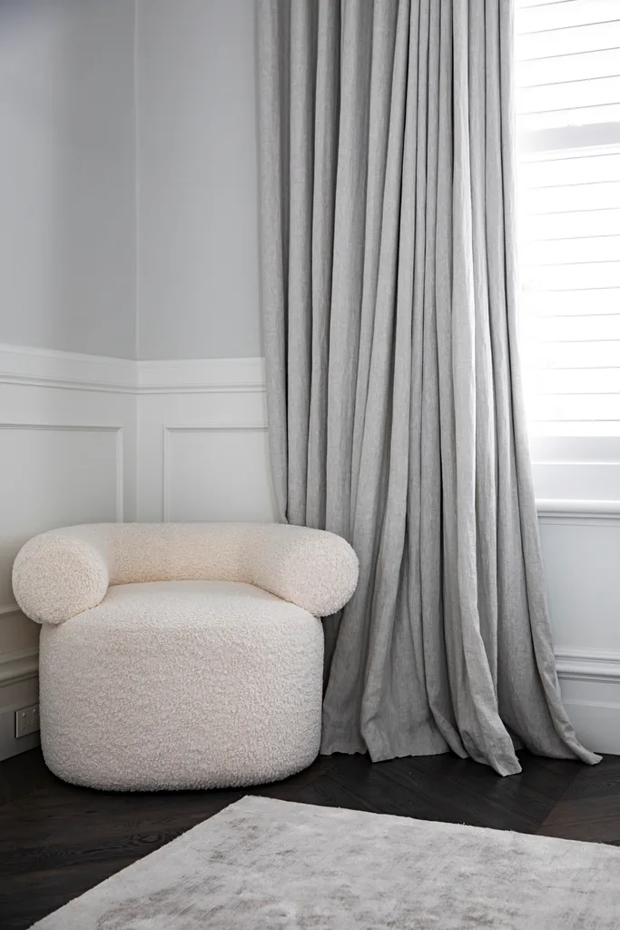 Sam and Snezana Wood home bedroom boucle armchair