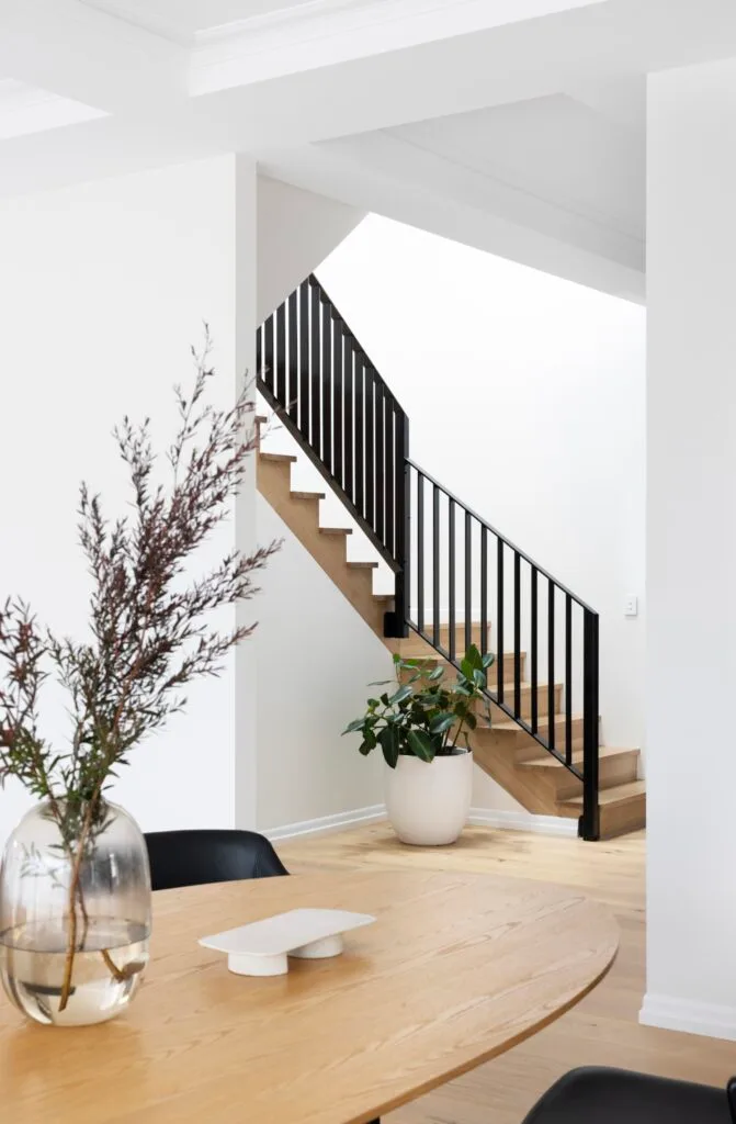 european farmhouse style build brisbane staircase black handrail