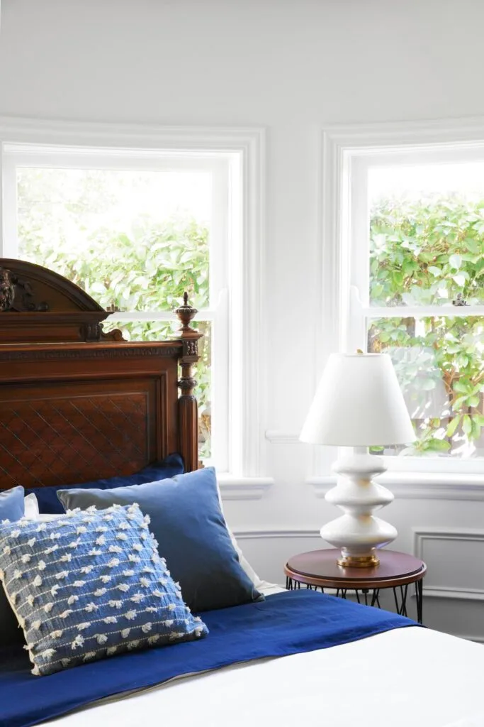 hamptons inspired bungalow upper north shore main bedroom blue pillows