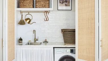 small laundry layout white splashback