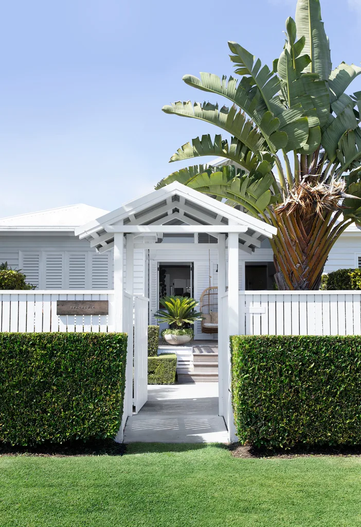Hamptons coastal chic front facade and hedges.
