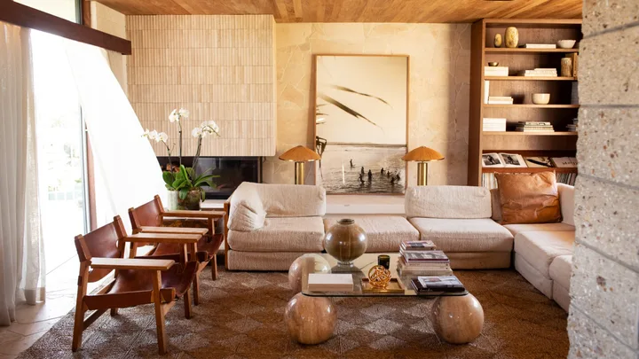 kara roselund's living room with a large artwork at the centre