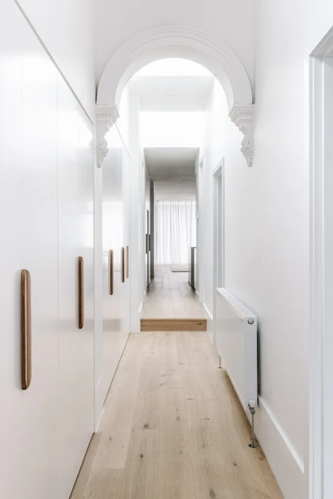 Cottage entry hallway and skylight with hydronic heater.