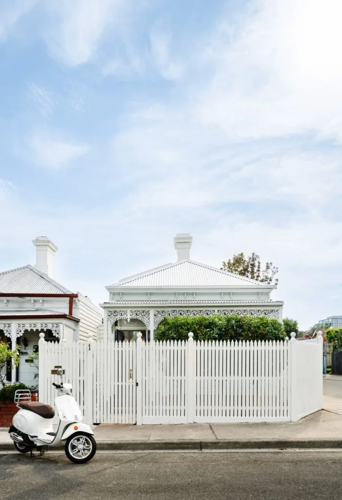 Melbourne energy efficient cottage exterior with white picket fence.