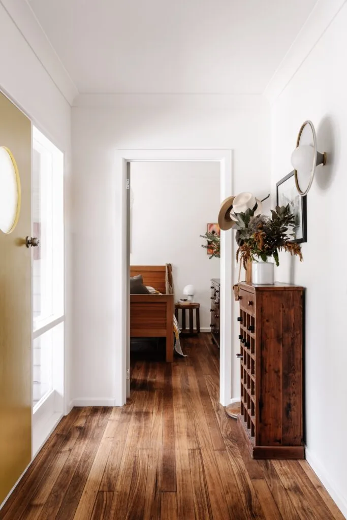 Sustainable timber entrance with timber sideboard.