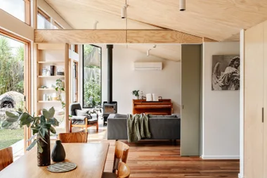 Sustainable timber dining room with family table.