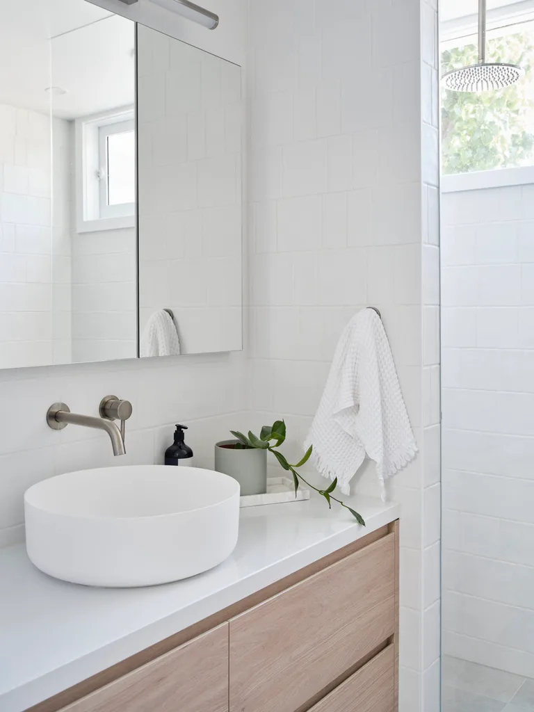 Modern Scandi style ensuite with subway tiles.