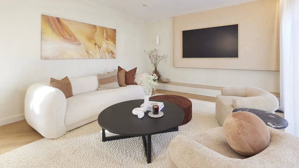 Neutral living room with curved sofa from The Block 2023 House 3.