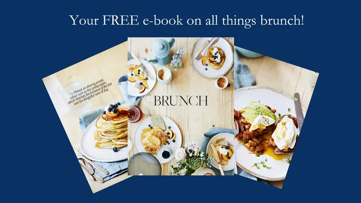 E-book cover with brunch dishes, including pancakes and avocado toast, on a wooden table. Text: "Your FREE e-book on brunch."