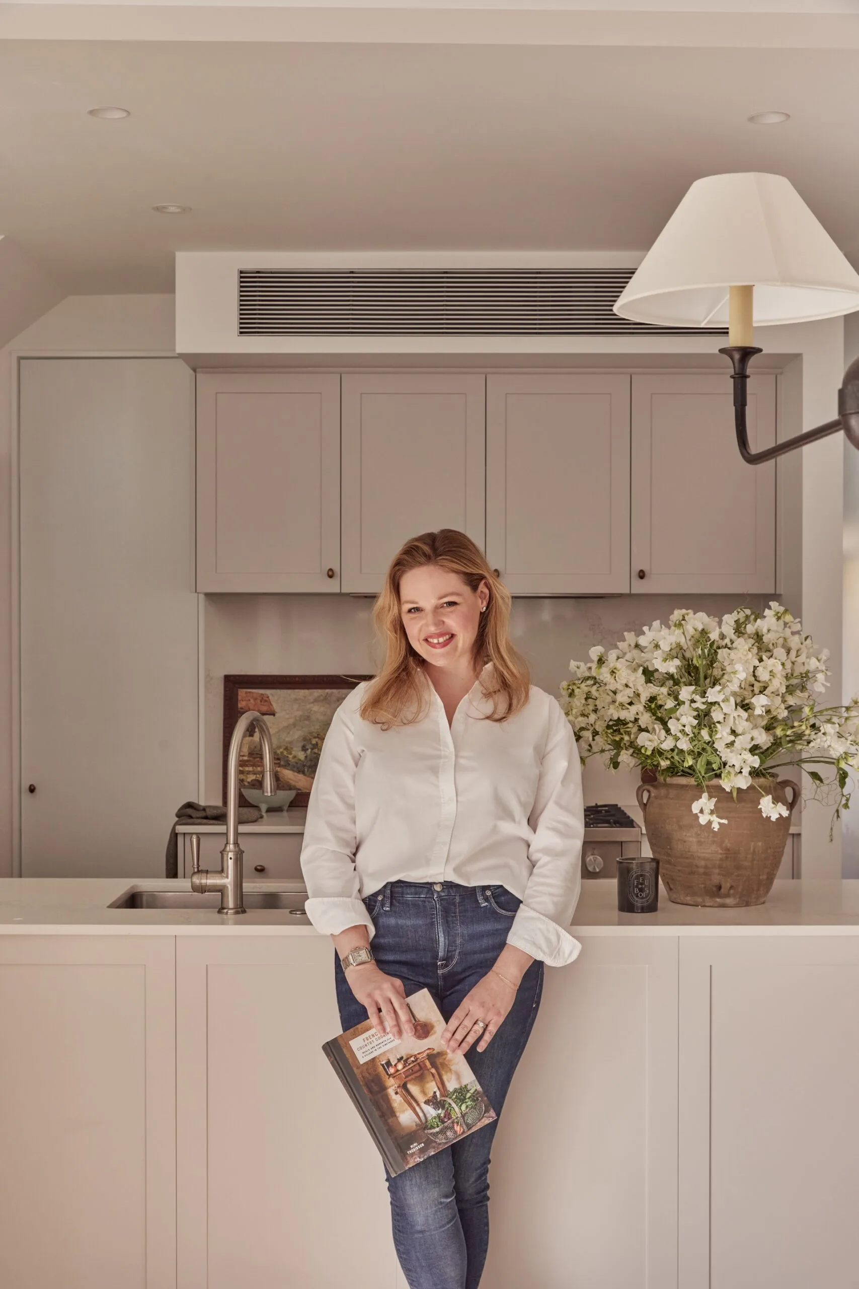 Elle Lovelock in her contemporary renovated kitchen.
