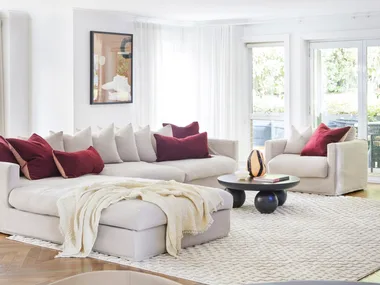 Zoe and Benji Marshall Sydney home living room with throw blanket on couch