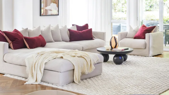 Zoe and Benji Marshall Sydney home living room with throw blanket on couch