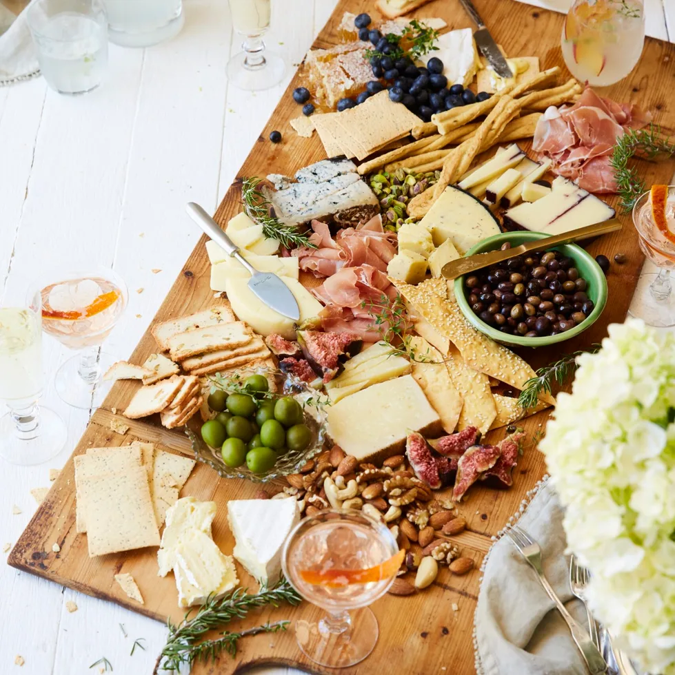 Antipasto grazing platter served on a timber board.