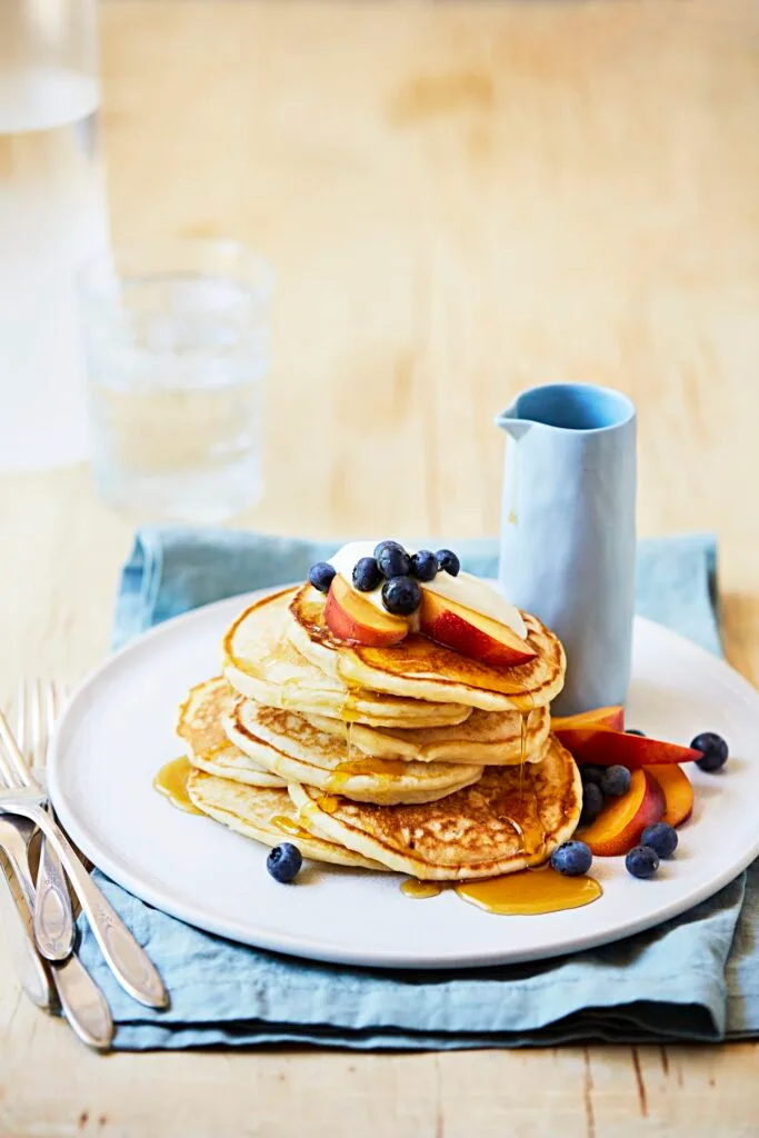 Buttermilk pancake stack with berries.