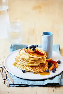 Buttermilk pancake stack with berries.