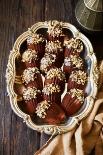 Chocolate hazelnut madeleines on a tray.