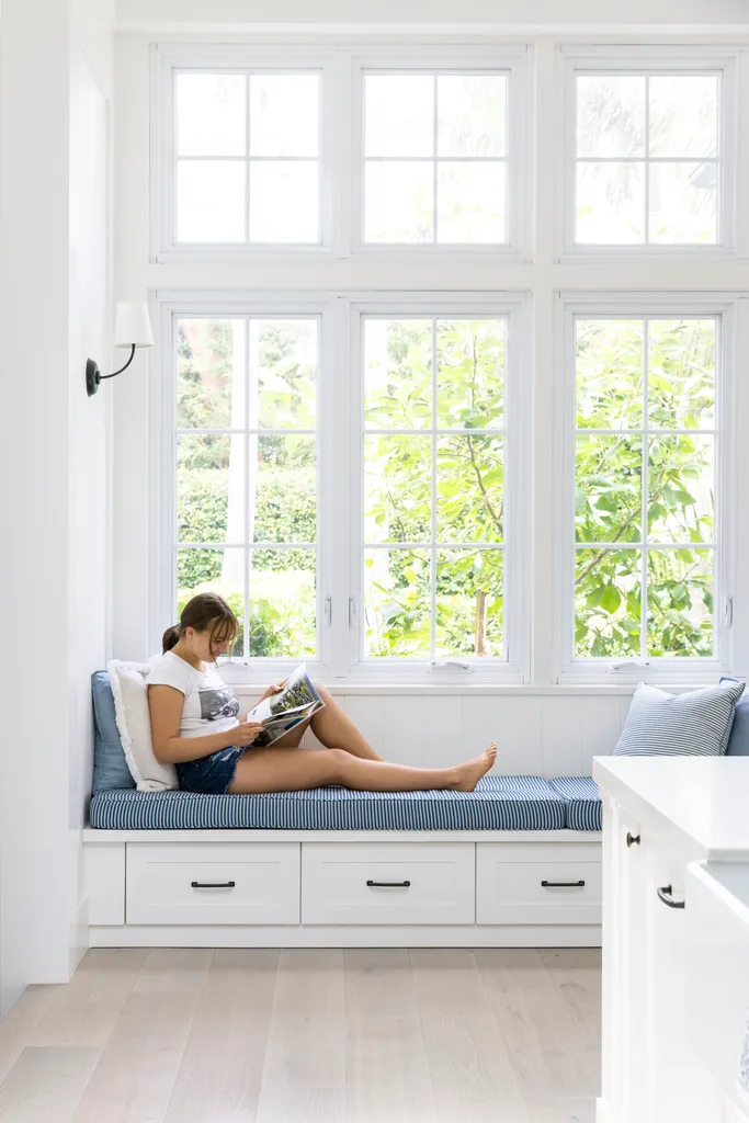 Window reading nook under French windows.