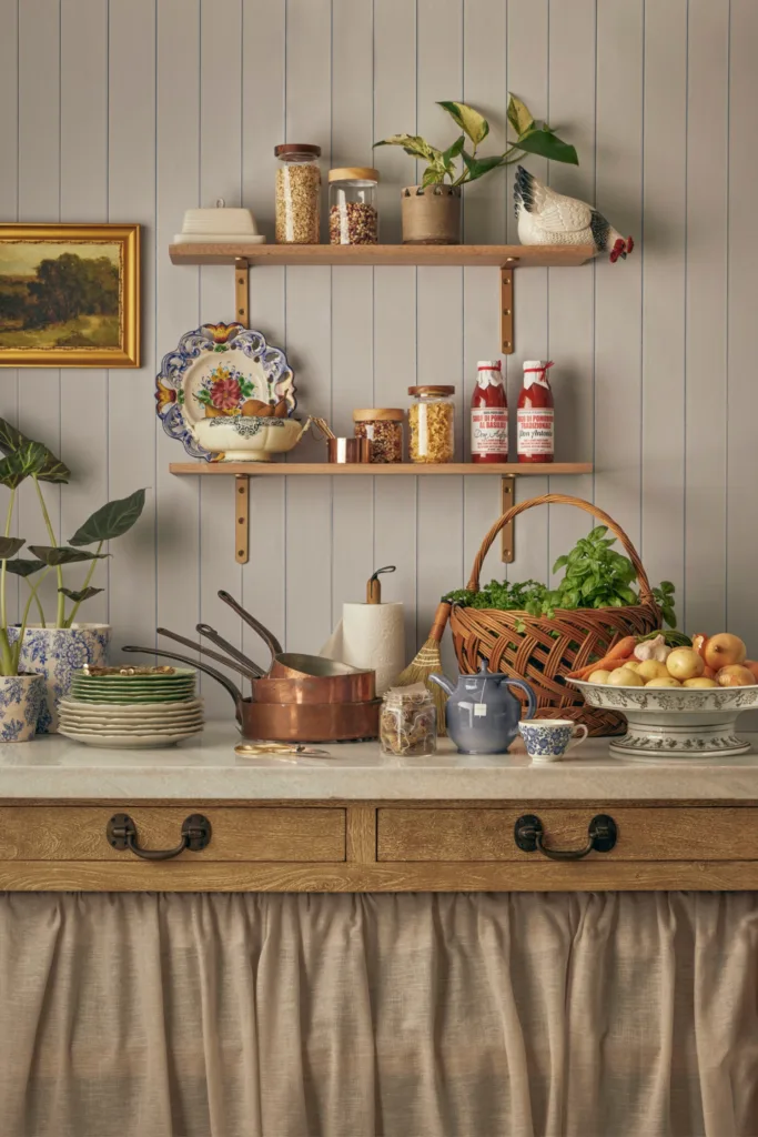 pantry with open shelves and gathered linen shelf skirt