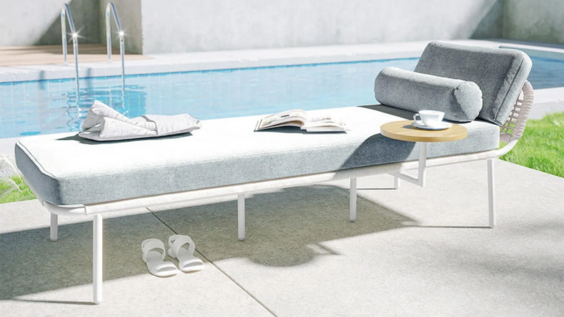 Andre wicker outdoor sunbed with cushion in light grey.