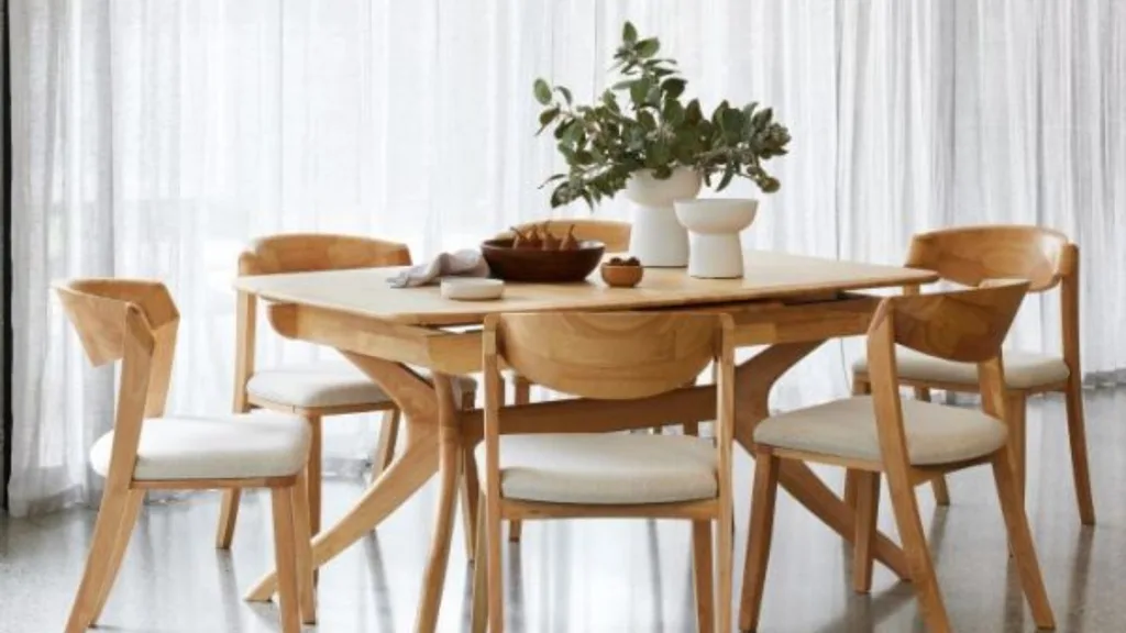 A wooden dining table and chairs from B2C Furniture.