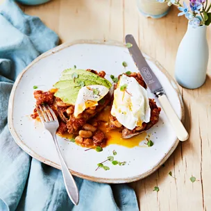 Homemade baked beans with avocado and eggs