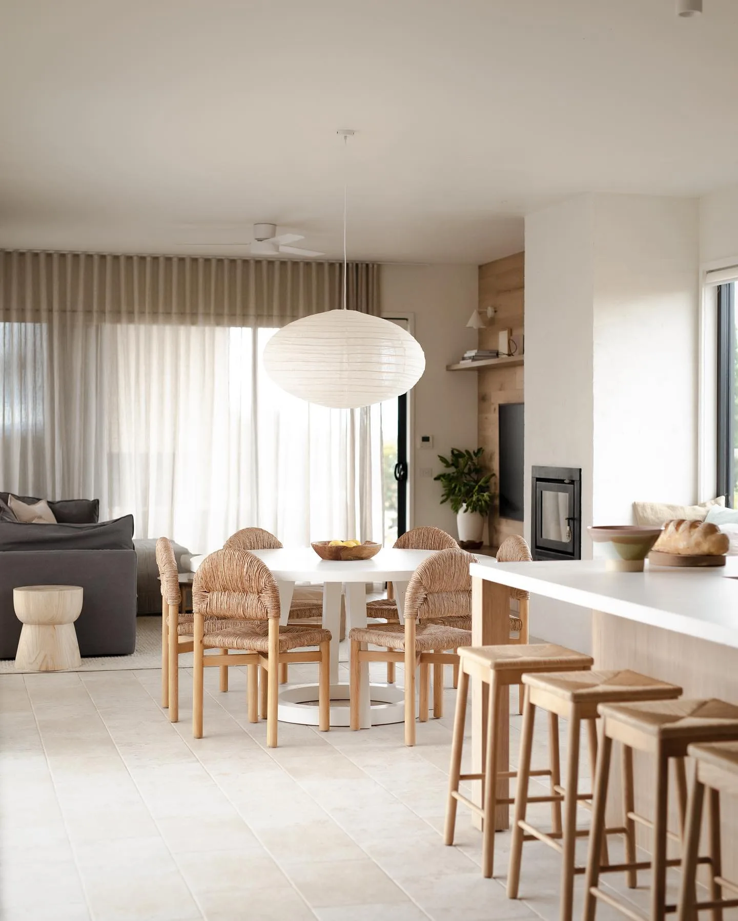 Neutral, open plan kitchen, dining and living room designed by Josh and Jenna Densten.