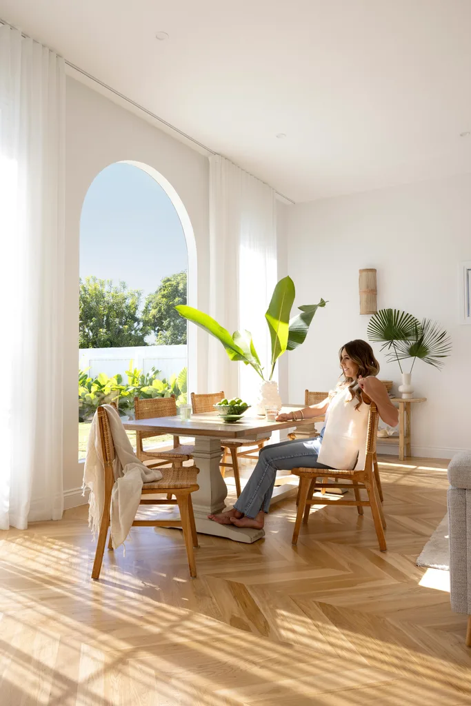 A resort-style dining area with oak flooring.