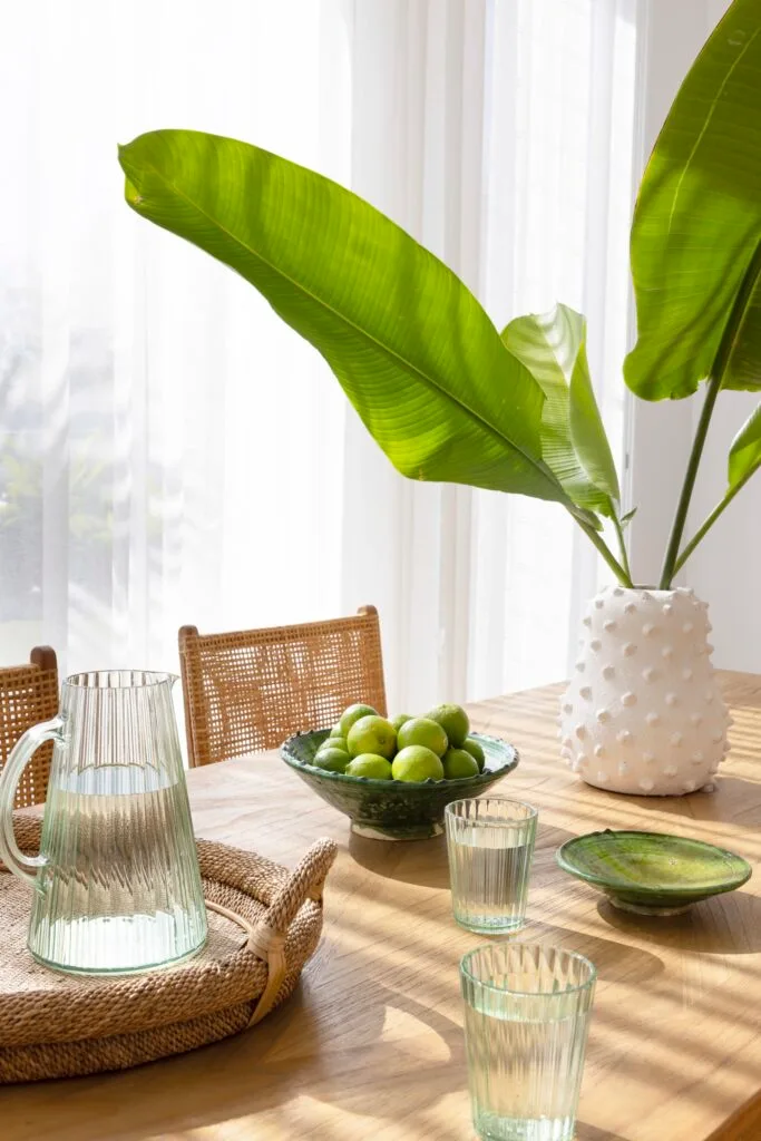 A timber dining table with Moroccan bowls.