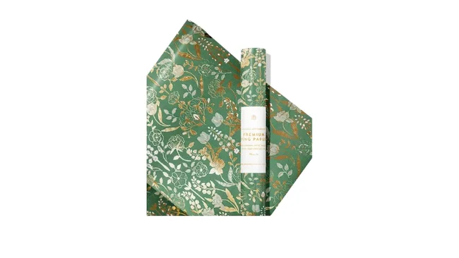 Green and gold floral wrapping paper with a rolled and flat sheet shown.