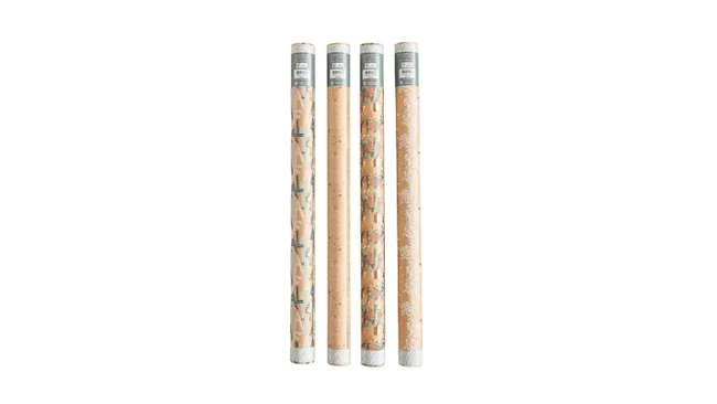 Four rolled sheets of patterned wrapping paper standing upright on a white background.