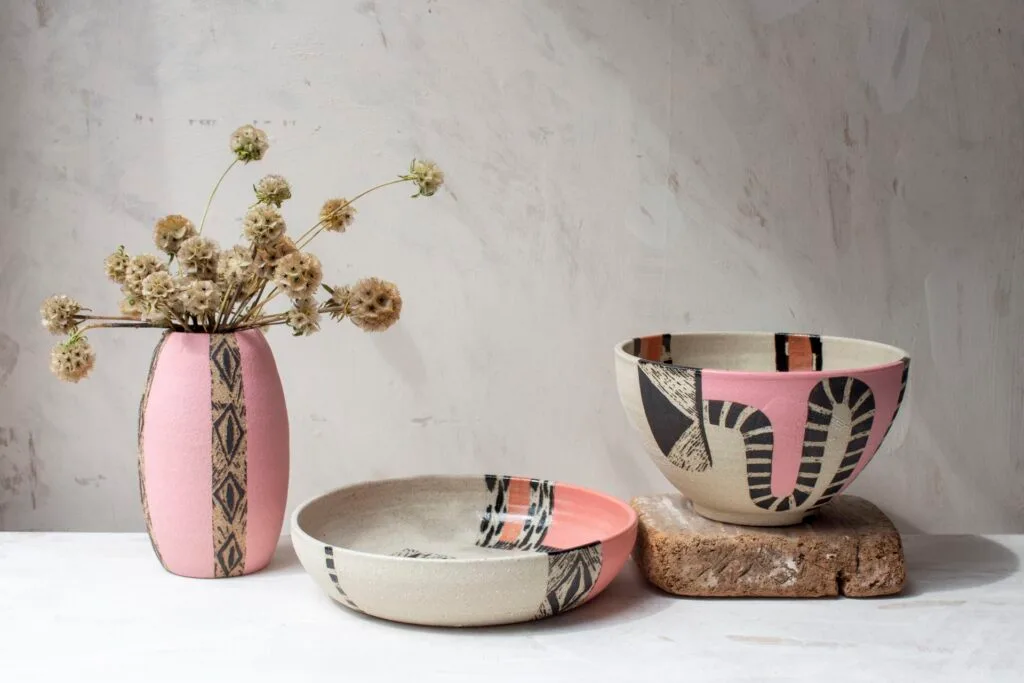 A collection of pink bowls and vessels by Christina McLean.