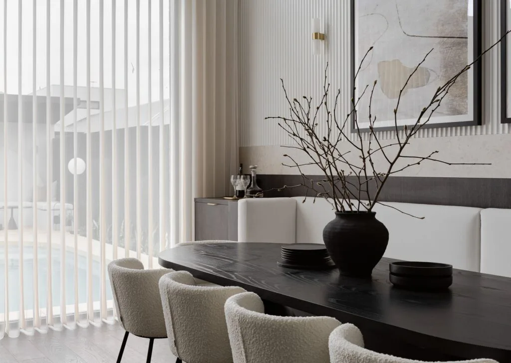 Neutral Japandi style dining room with an oak table, boucle chairs and fluted walls.