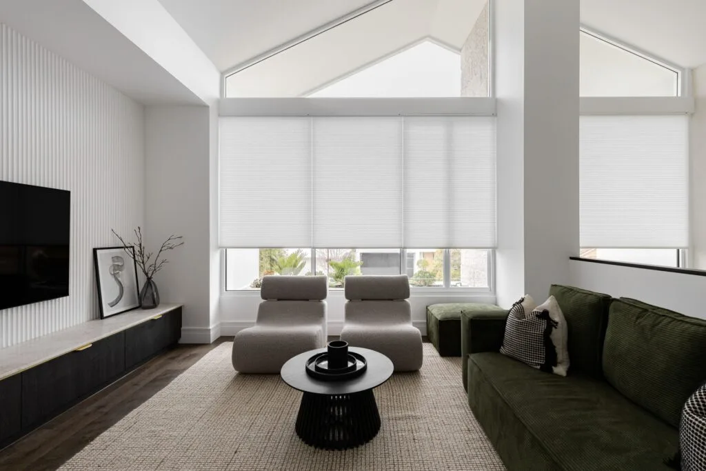 Japandi style living room with raised ceilings and clerestory windows.