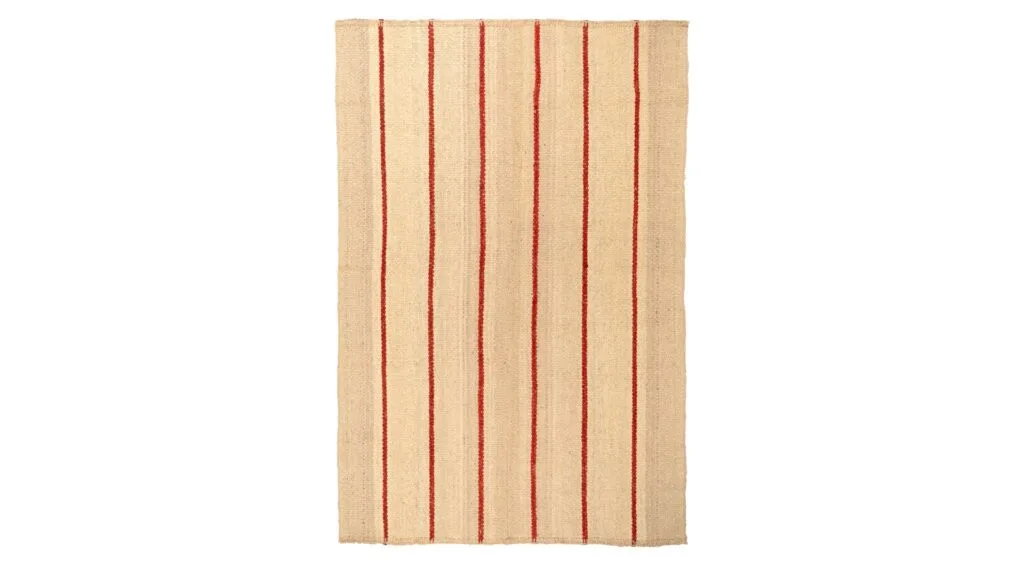 A rustic red striped rug.