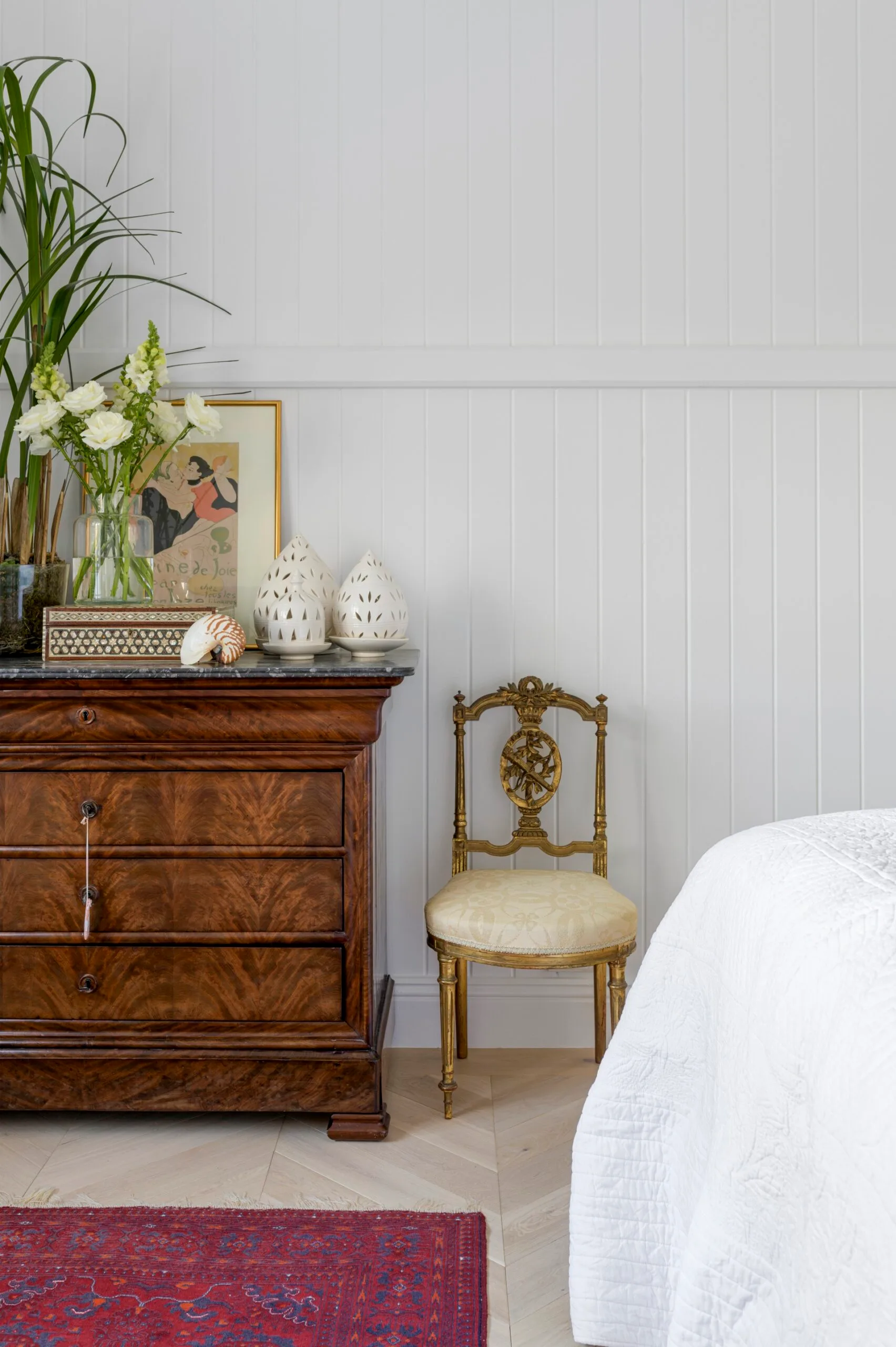 A vintage style timber dresser and chair.