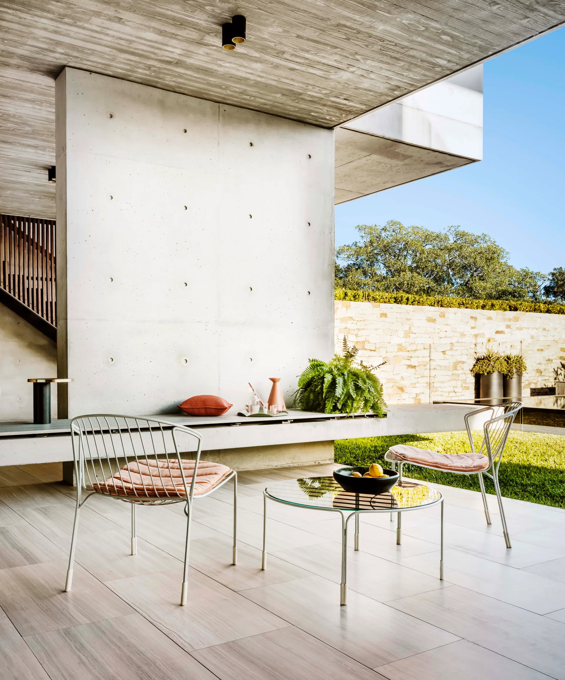 An outdoor minimalist furniture setting.